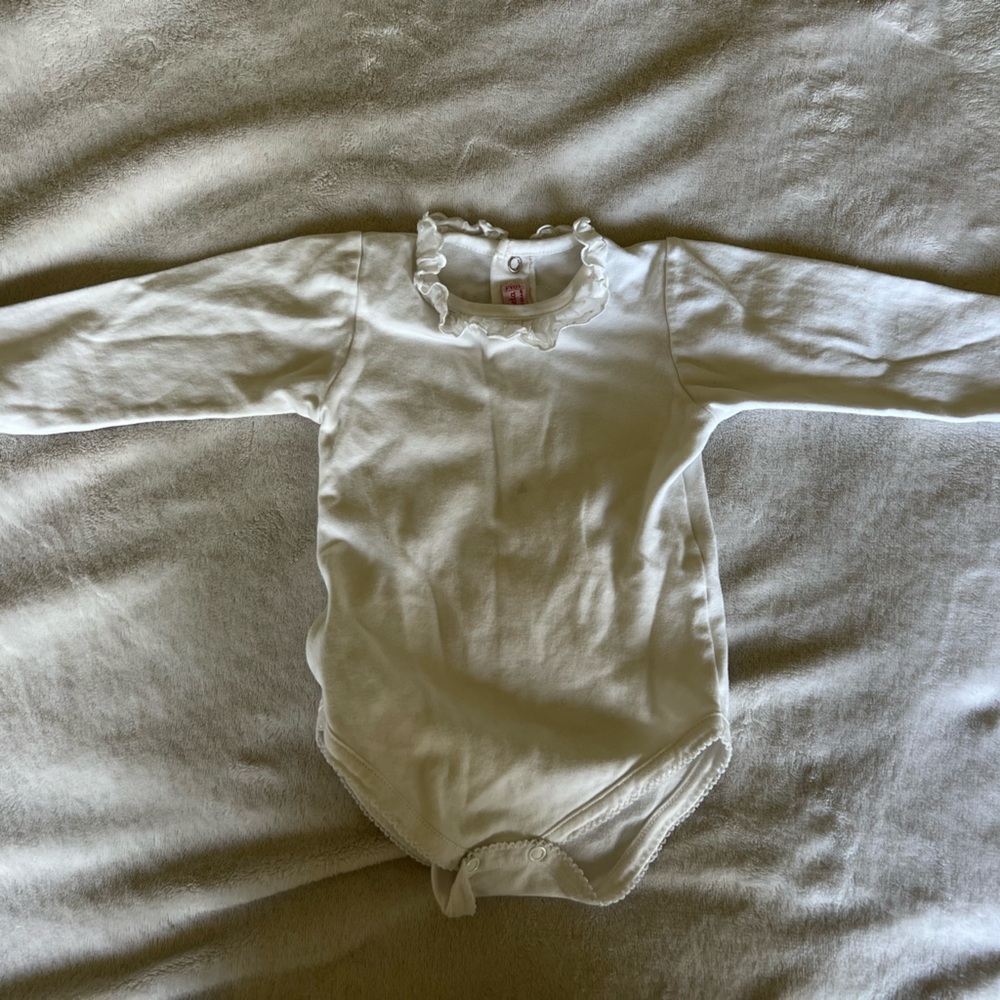 La Coqueta long sleeve white Pima cotton onesie